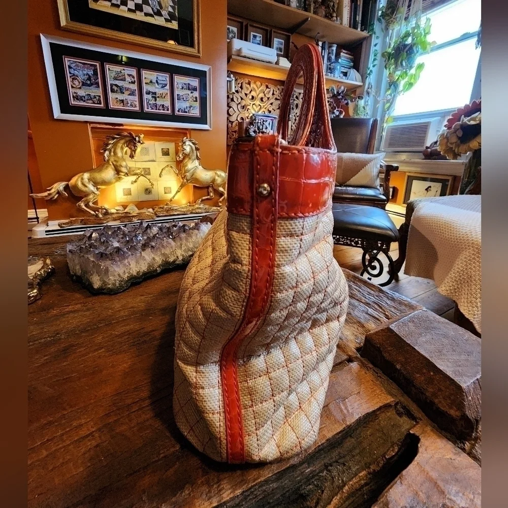 STUART WEITZMAN quilted tote with orange patent leather accents & gold hardware